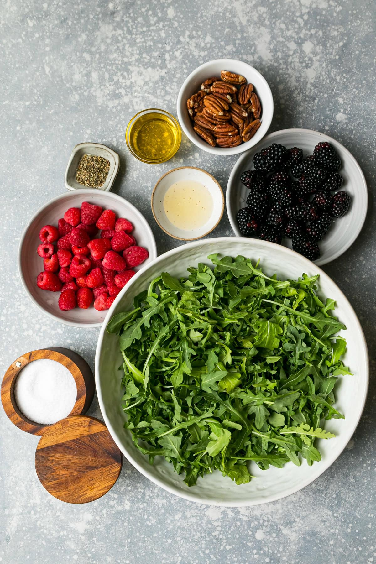 Arugula, blackberries, blueberries and pecans