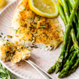 Broiled Tilapia Oreganata with lemon and asparagus
