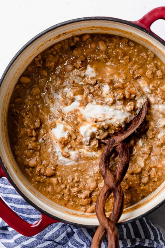 A delicious, creamy White Bean Turkey Chili recipe made with canned white beans, ground turkey, aromatics and spices – no tomatoes!
