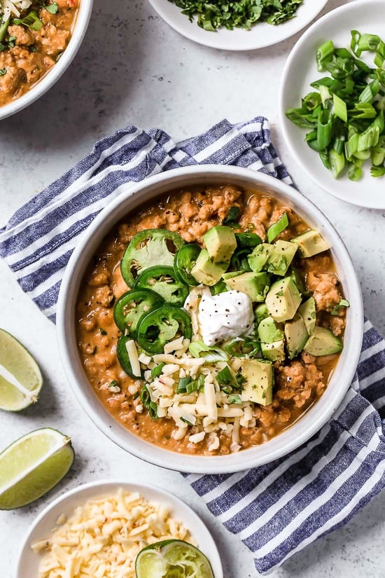 A delicious, creamy White Bean Turkey Chili recipe made with canned white beans, ground turkey, aromatics and spices – no tomatoes!