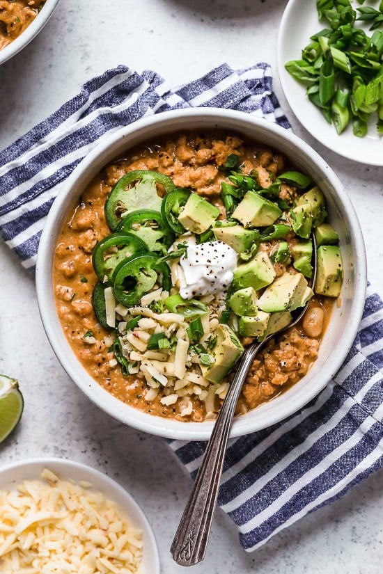 A delicious, creamy White Bean Turkey Chili recipe made with canned white beans, ground turkey, aromatics and spices – no tomatoes!
