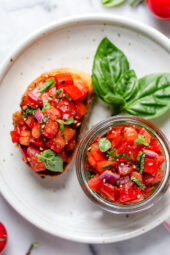 Bruschetta with Tomato and Basil, one of my favorite way to use up my summer tomatoes is with this simple appetizer or side dish.