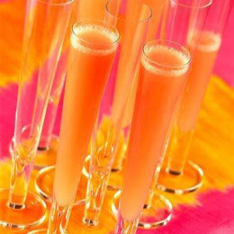 This Mother's Day treat your Mom to a delicious mango Bellini cocktail. This is a unique twist on an old favorite and great served with brunch. Also perfect for any summer party!