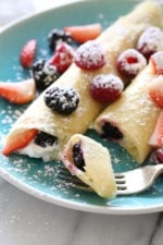 These blender crepes are so easy to make, and are perfect to serve for breakfast or dessert. They can be filled with fruit, jam, yogurt, ice cream, you name it!
