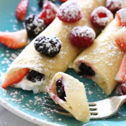 These blender crepes are so easy to make, and are perfect to serve for breakfast or dessert. They can be filled with fruit, jam, yogurt, ice cream, you name it!