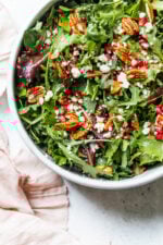 This beautiful, delicious fall or winter salad is made with mixed baby greens, pomegranate, gorgonzola and pecans with a pomegranate vinaigrette.