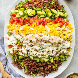 Overhead view of Cobb salad with red wine tomato vinaigrette