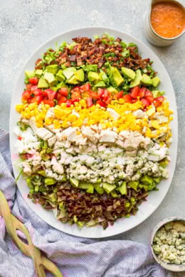 Overhead view of Cobb salad with red wine tomato vinaigrette