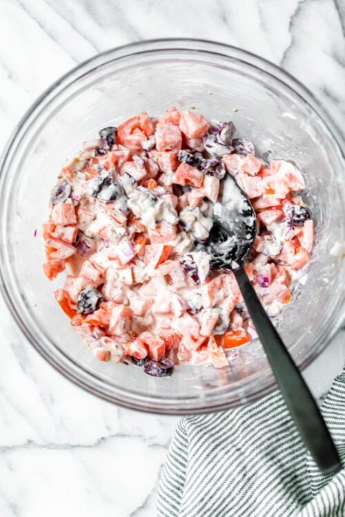 tomatoes and mayo in a bowl