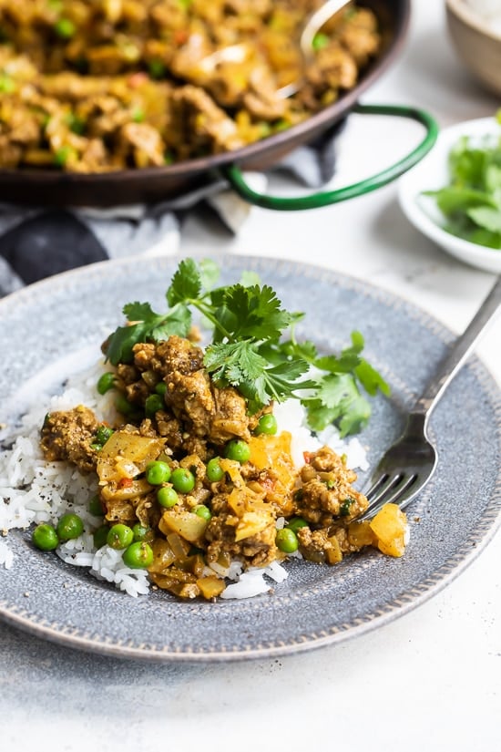 lamb peas and rice on a plate