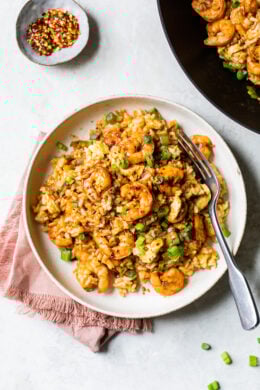 Spicy Shrimp Fried Rice made healthier using leftover cooked brown rice, a delicious whole grain that's high in fiber, so it fills you up.