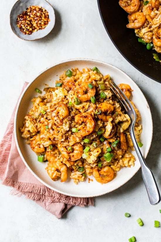 Spicy Shrimp Fried Rice made healthier using leftover cooked brown rice, a delicious whole grain that's high in fiber, so it fills you up.