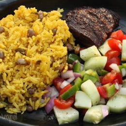 I've gotten requests to add more latin recipes to my site which for me is never a problem since I LOVE latin food! Arroz Con Gandules (Rice with Pigeon Peas) is a Puerto Rican dish popular in the Carribean. The pigeon peas are loaded with fiber which makes this a healthy side if cooked right.