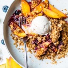 Blueberry Peach Crisp with a skoop of ice cream