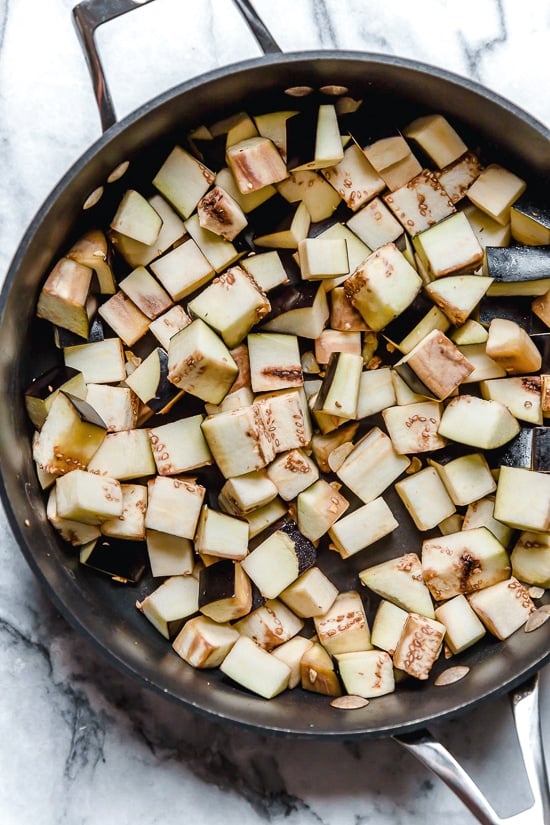 This simple Eggplant and Tomato Sauce is delicious, made with diced eggplant stewed in tomatoes and garlic. I love it served over pasta but it's also great as a side dish on it's own.