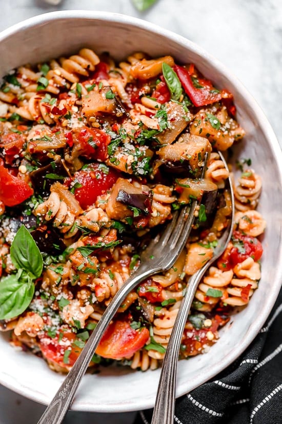 This simple Eggplant and Tomato Sauce is delicious, made with diced eggplant stewed in tomatoes and garlic. I love it served over pasta but it's also great over zucchini noodles, polenta or as a side dish on it's own.