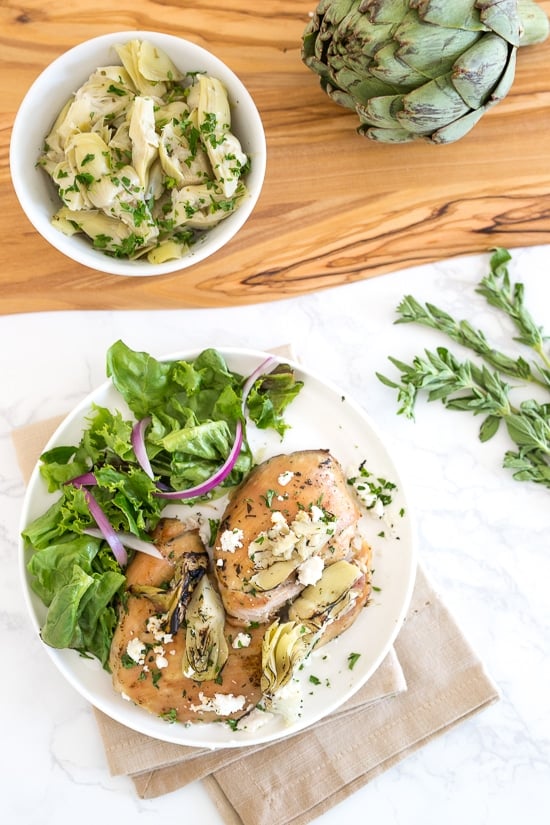 Chicken Thighs with Artichoke Hearts and Feta Cheese is made with just a few ingredients and is ready in less than 30 minutes!