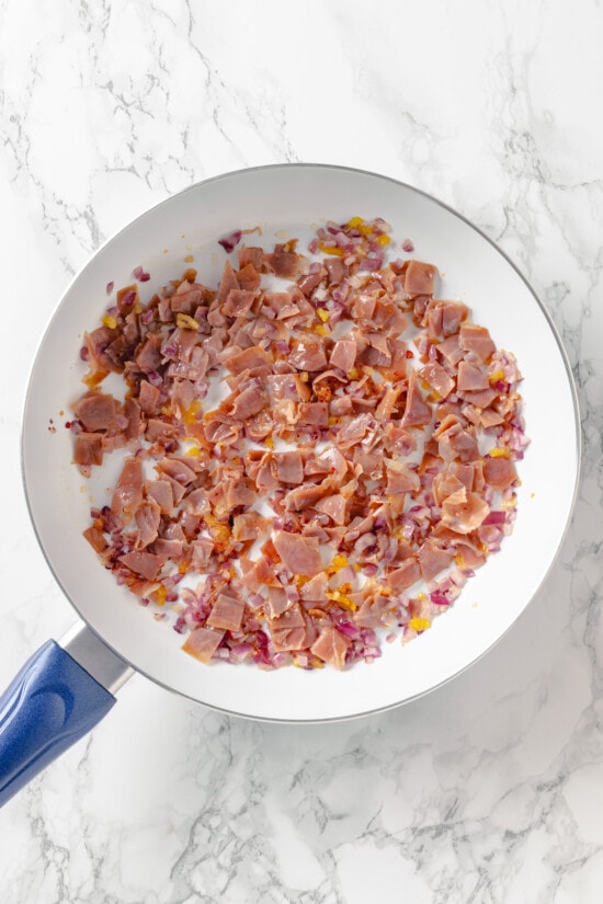 Penne alla Vodka is a simple yet showstopping pasta dish. The creamy tomato vodka sauce comes together in less than 30 minutes. Prosciutto in a skillet