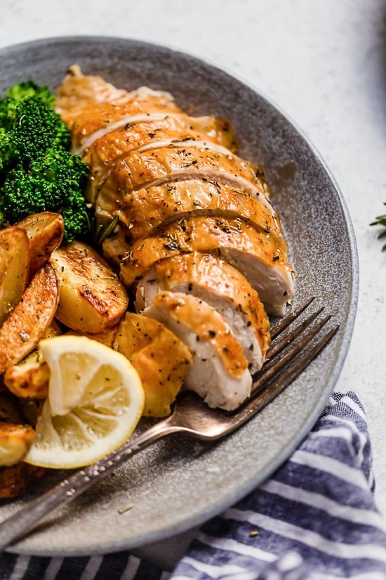 Juicy, tender roasted chicken seasoned with lemon and rosemary, always a winner in my house!