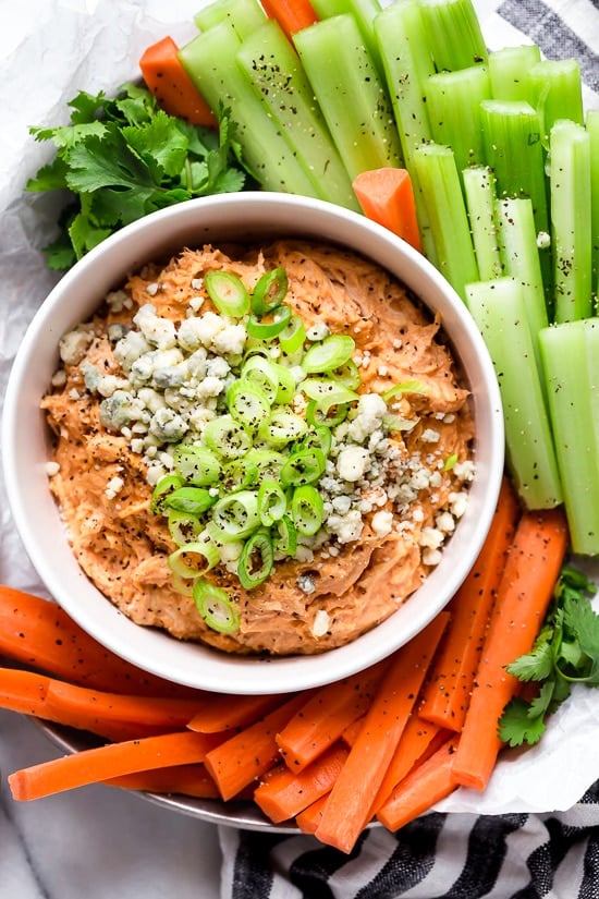 This Slow Cooker Buffalo Chicken Dip has everything you love about buffalo wings, only made into a dip – the perfect party appetizer, no messy hands!