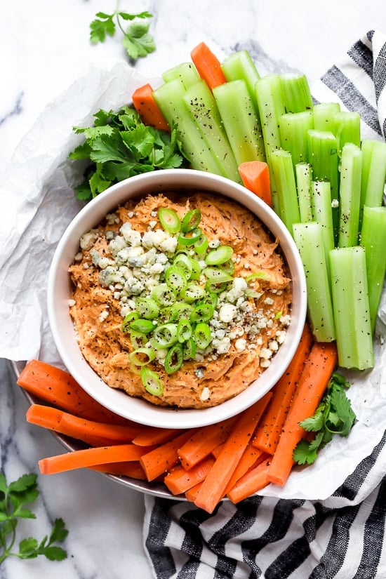 This Slow Cooker Buffalo Chicken Dip has everything you love about buffalo wings, only made into a dip – no messy hands!