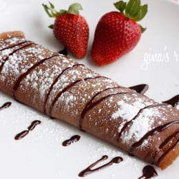 Satisfy your chocolate craving with these delicious, easy to make crepes filled with strawberries and cream. The perfect Valentine's Day breakfast or dessert! You can make the batter ahead of time and refrigerate what you don't use.