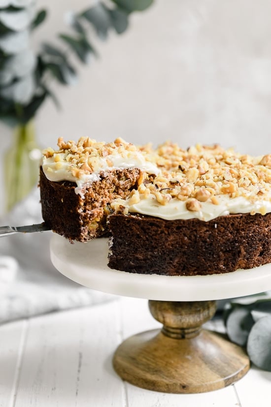 This super moist carrot cake recipe made from scratch is perfect for Easter or anytime of the year. Made with a can of crushed pineapple which makes it very moist, without adding a ton of fat.
