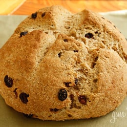 I love to have Irish Soda Bread for breakfast hot out of the oven with some low fat spread and a cup of tea. This is very easy to make, even if you have no experience baking. If you prefer to make a bread to serve with dinner, omit the raisins and sugar and you can add caraway seeds.