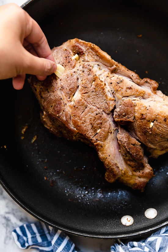 Slow Cooker Pork Carnitas or Mexican Pulled Pork is the best Mexican pork recipe whether you stuff it into a tortilla, taco or turn it into a burrito bowl!