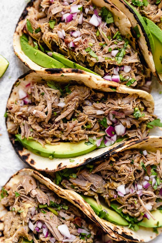Slow Cooker Pork Carnitas or Mexican Pulled Pork is the best Mexican pork recipe whether you stuff it into a tortilla, taco or turn it into a burrito bowl!