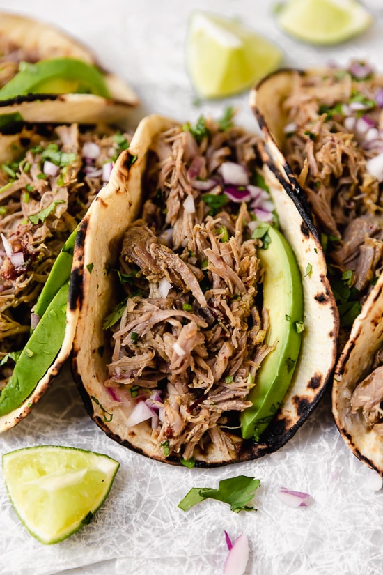 Slow Cooker Pork Carnitas or Mexican Pulled Pork is the best Mexican pork recipe whether you stuff it into a tortilla, taco or turn it into a burrito bowl!