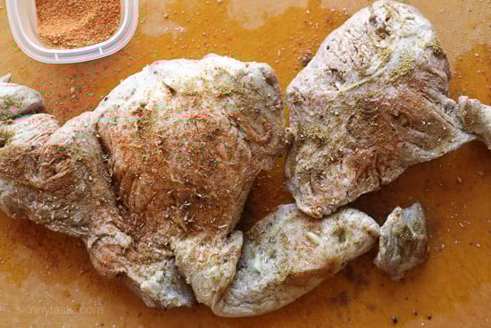 The best Instant Pot Carnitas recipe! Make juicy Mexican pulled pork in the pressure cooker for tacos, burrito bowls, taco salads, and more. Browned and seasoned pork shoulder on a countertop.