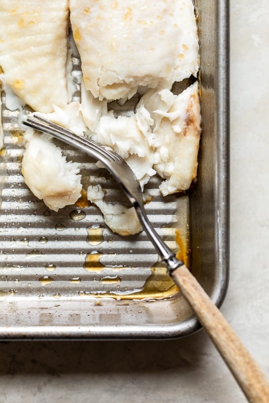 Broiled Tilapia with Thai Coconut Curry Sauce has so much flavor, perfect over jasmine rice to absorb all the delicious sauce.
