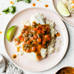 Broiled Tilapia with Thai Coconut Curry Sauce has so much flavor, perfect over jasmine rice to absorb all the delicious sauce.