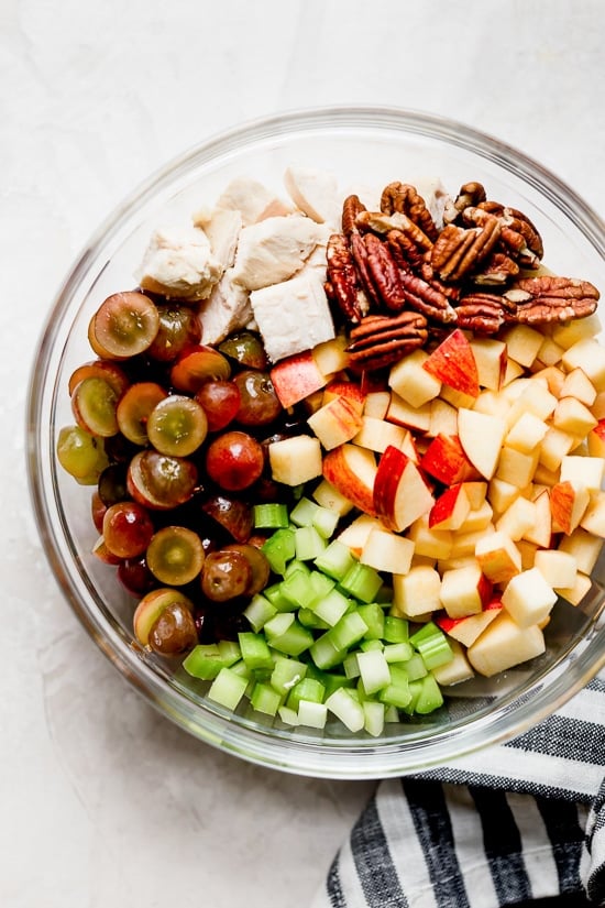 Chopped ingredients for Chicken Waldorf Salad in a bowl.