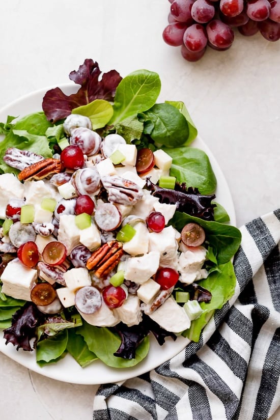 Chicken Waldorf Salad is a classic salad made with apples, grapes, pecans and celery in a light, creamy dressing.