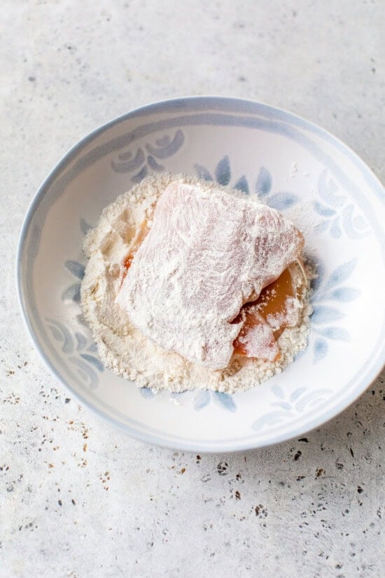 This lighter chicken saltimbocca is a restaurant-quality dinner with chicken cutlets stuffed with prosciutto and sage in white wine sauce. chicken dredged in flour