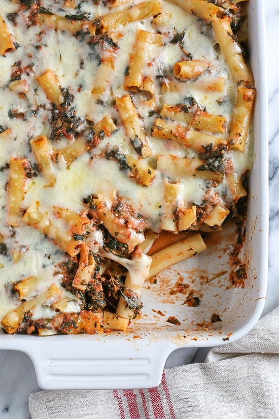 Baked ziti is a favorite comfort dish in my home! Adding spinach is a quick and easy way to get more leafy greens into your family's diet without complaints.