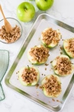Baked apples topped with oats, cinnamon and a touch of brown sugar. Easy to make and a great way to use up those apples this Fall!