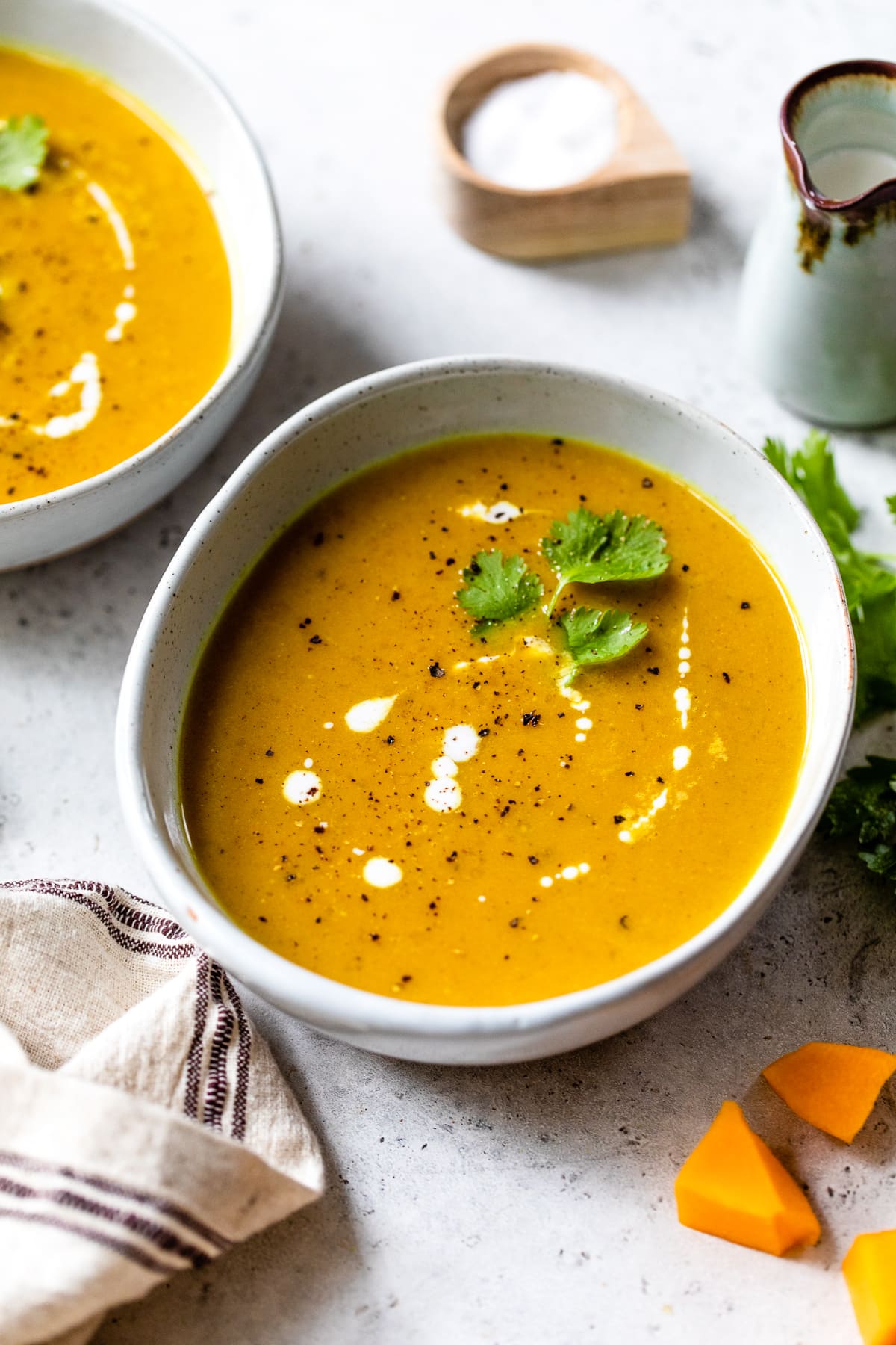 This Butternut Squash Soup is made with coconut milk, curry, and Indian spices which perfectly compliment the flavor of the butternut squash. Butternut Squash Soup