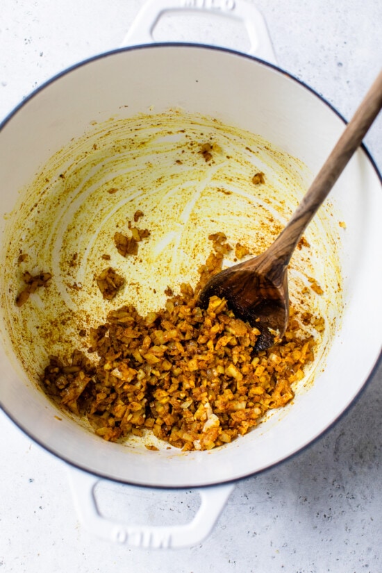 This Butternut Squash Soup is made with coconut milk, curry, and Indian spices which perfectly compliment the flavor of the butternut squash. sauteed onions, curry and garam masala