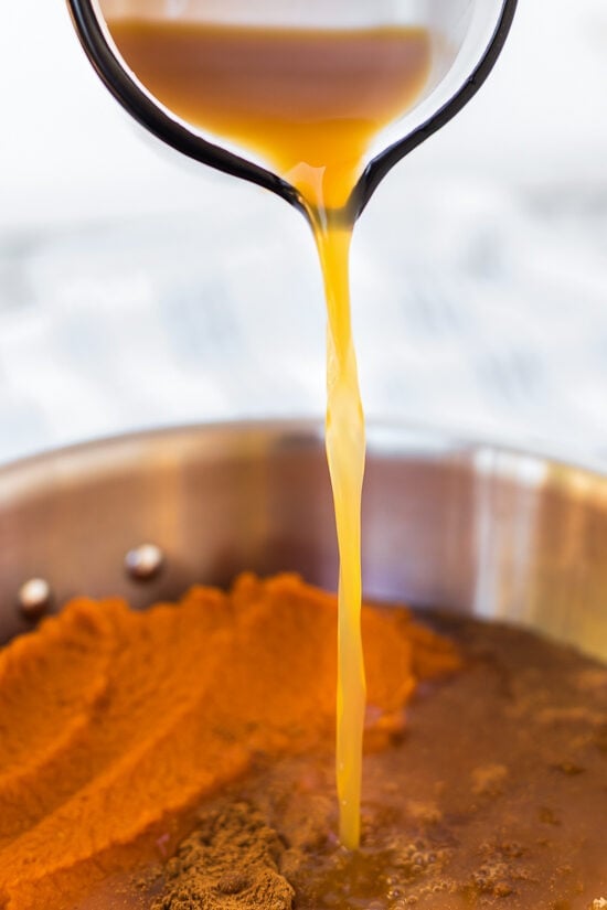 Add juice and simmer until thickened.