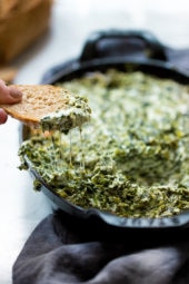 Slice of bread with hot spinach dip