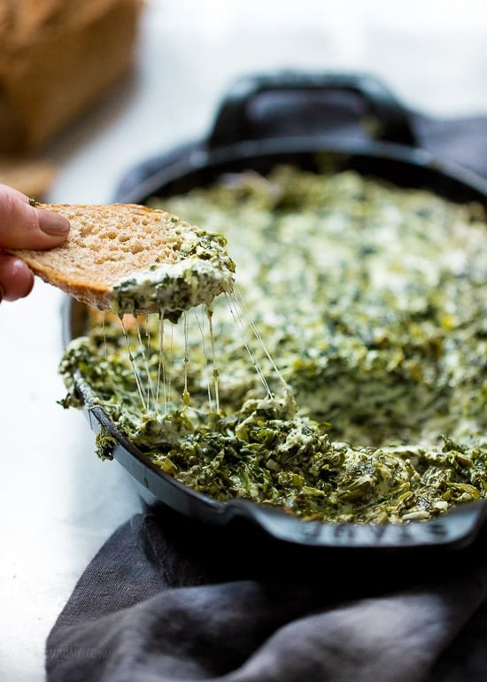 Slice of bread with hot spinach dip