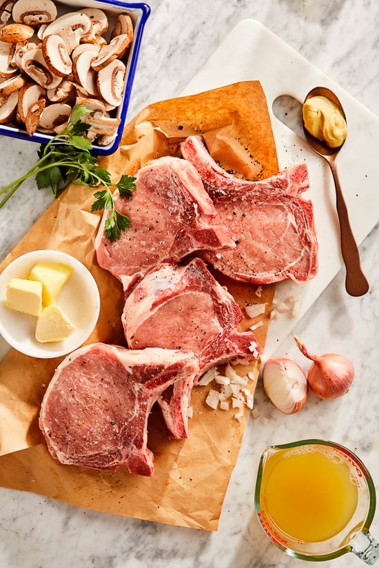 These Pork Chops with Mushrooms and Shallots are juicy and flavorful, perfect for weeknight dinner!