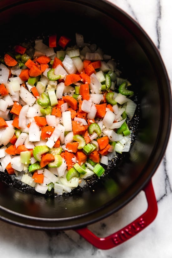 Spinach Tortellini en Brodo (in broth) is an Italian soup made with spinach and cheese tortellini and vegetables in a light broth.