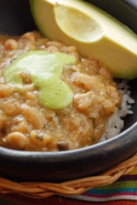 Beans are high in complex carbohydrates, protein and dietary fiber, low in fat, calories and completely cholesterol-free. Eating as little as a half a cup of beans a day can be beneficial in reaching your dietary needs. These beans were a hit with my family, all that was leftover was this little bit shown here over rice, topped with aji verde sauce.