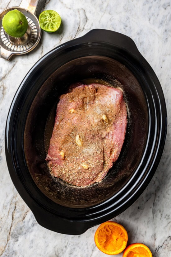 Seasoned pork in slow cooker insert
