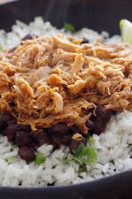 Sweet and spicy slow cooked barbacao pork sweetened with brown sugar, cola, chipotle chilies, green chilies, cumin and spices. Delicious over cilantro lime rice and black beans.