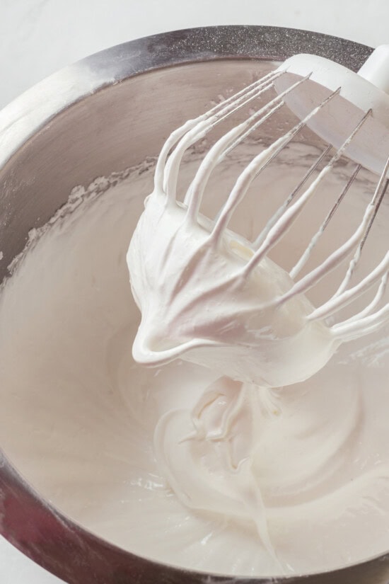 Pavlova is an elegant, light dessert that pairs airy meringue nests with whipped cream and fresh fruit. It's almost too pretty to eat! Whisk attachment whipping egg whites